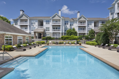 Salt water swimming pool with lounge seating