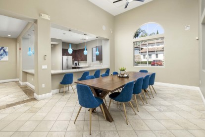 Camden Crown Valley Apartments Mission Viejo CA Clubhouse with Dining Table and Kitchen for Events