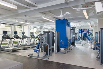 Fitness center with cardio and strength training equipment