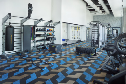 Camden NoDa apartments in Charlotte, large Athletic Club with strength training equipment