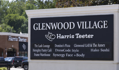 Glenwood Village Shopping Center across the street from Camden Carolinian Apartments in Raleigh, NC