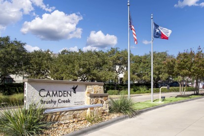 Entry sign and flags at Camden Brushy Creek