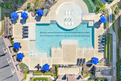 Aerial View of the resort-style pool at Camden Cypress Creek Apartments in Cypress, Tx