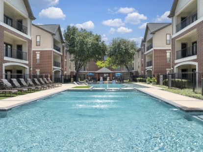 Pool 2 with fountains at Camden Farmers Market apartments in Dallas, TX