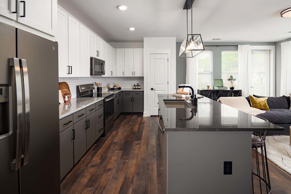 Spacious kitchen and living area with modern finishes at Camden West Nashville apartments in Nashville, TN