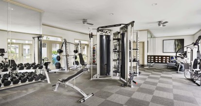 Fitness center with free-weights at Camden Midtown Apartments in Houston, TX