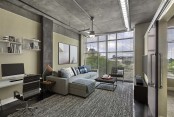 Living room with work from home space and floor to ceiling windows