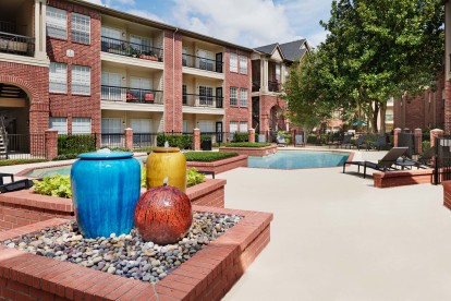 Pool with water features at Camden Stonebridge Apartments in Houston, TX