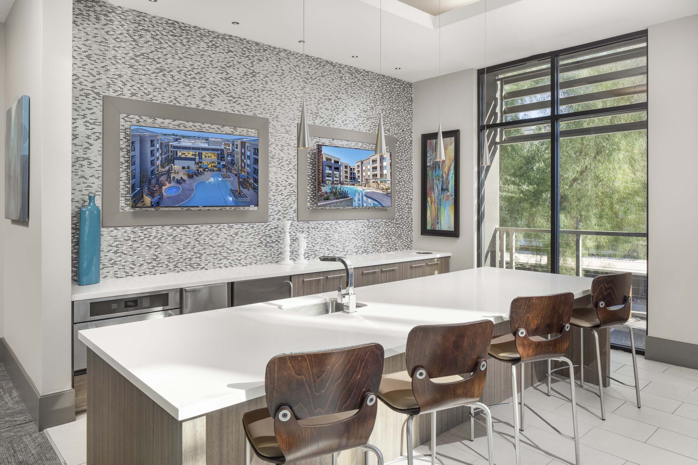 Camden Tempe Apartments Tempe Arizona Resident Lounge with Catering Kitchen and TVs