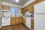 Classic style kitchen with hardwood style floors