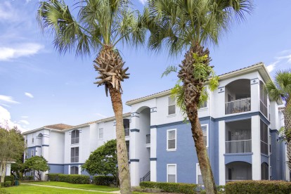 Building exterior at Camden World Gateway apartment community in Orlando, FL