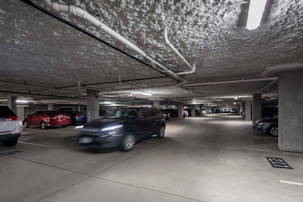 Underground parking garage under the Flats side of Camden Greenville apartments in Dallas, TX