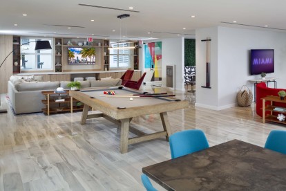 Resident lounge with billiards at Camden Brickell Apartments in Miami, FL.