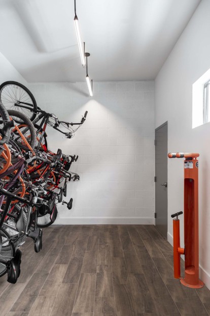 Indoor bicycle storage rack and service station 