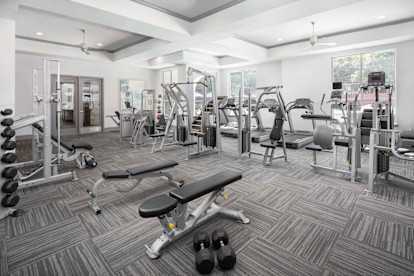 Fitness center with free weights at Camden City Centre Apartments in Midtown Houston, Tx