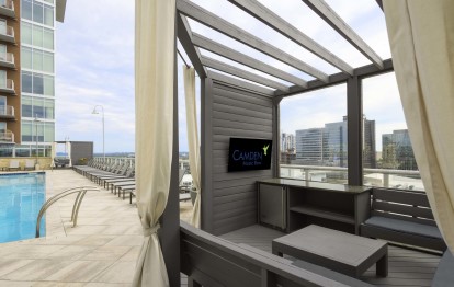 Rooftop private cabana with tv and refrigerator at Camden Music Row apartments in Nashville, TN