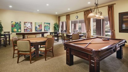 Resident lounge with billiards and shuffleboard