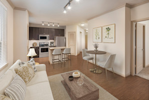 Open-concept living room and kitchen with dining area at Camden La Frontera