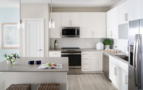 Camden Clearwater apartments have open concept kitchens with modern interior finishes