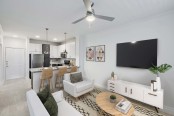 Open-Concept Living Spaces with Bar Seating at Camden Heights Apartments in Houston, TX
