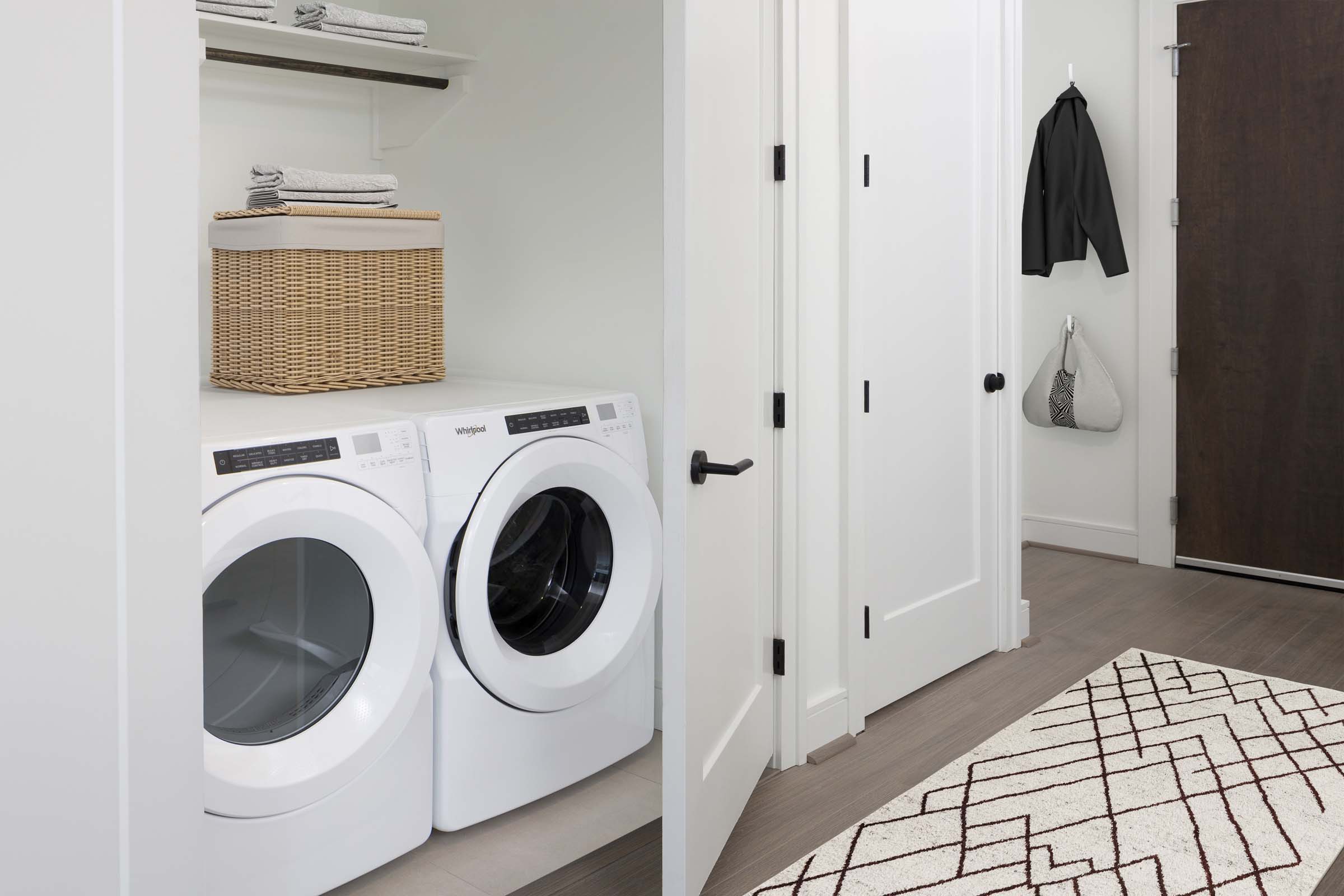 Laundry room with full size washer and dryer