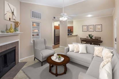 Living room top floor with extended ceilings and ceiling fan