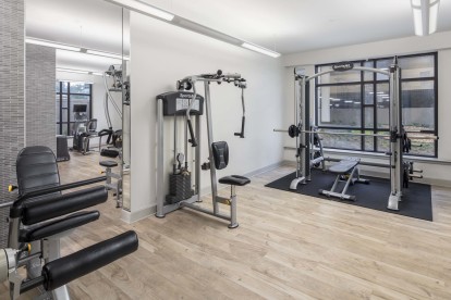 24 hour fitness center with strength and cardio equipment at Camden Post Oak Apartments in Houston, Tx