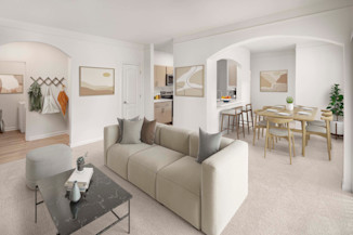 Open-concept living and dining room at Camden Westwood apartments in Morrisville, NC