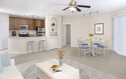 Open-concept living area at Camden World Gateway Apartments in Orlando, FL