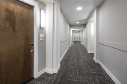 Interior hallway at Camden Victory Park apartments in Dallas, TX