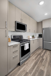 Kitchens Feature Soft-Close Cabinetry with Gas Ranges