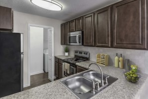 Traditional style kitchen with stainless steel appliances