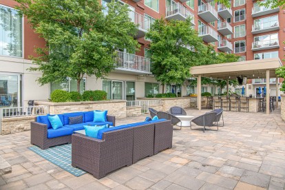 Poolside lounge and covered outdoor kitchen