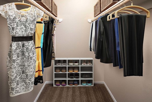 Large closet with built in hanging racks