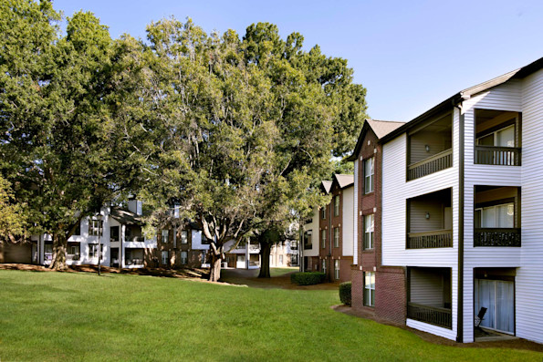 Building exterior with balconies at Camden Fairview apartments in Charlotte, NC