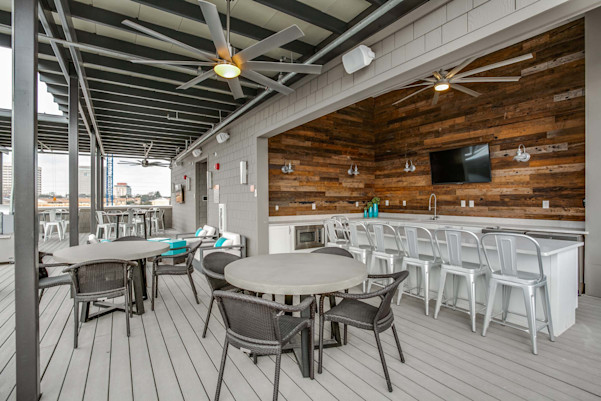 Villas side rooftop lounge with covered kitchen and bar area