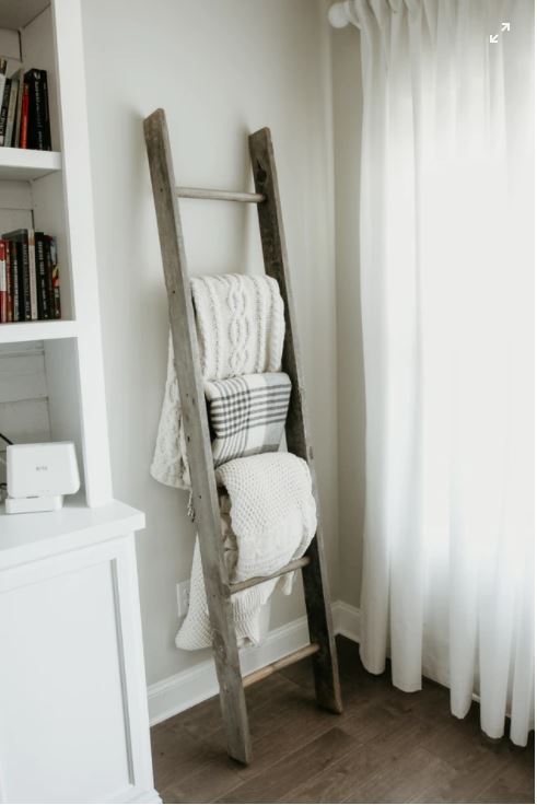 Ladder with blankets hung