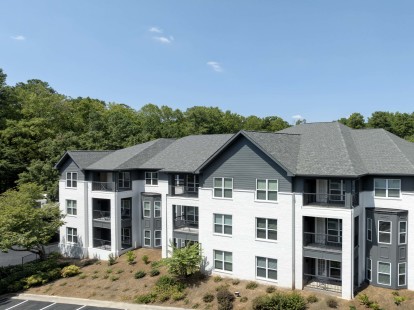 Renovated building exterior with white brick at Camden Phipps in Atlanta GA