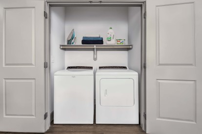 Laundry area with full-size washer and dryer