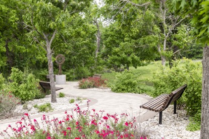 Local park with trail and bench close to Camden Panther Creek apartments in Frisco, TX