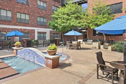 Third pool with BBQ grills and seating
