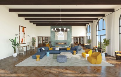 Resident lounge with fireplace and large arched windows