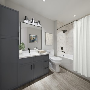 Modern style bathroom with gray cabinets and white countertop at Camden Village District in Raleigh, NC