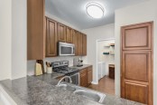 Kitchen with adjacent laundry area