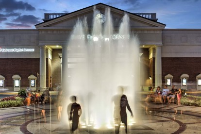 Fairfax corner cinema fountain nighttime