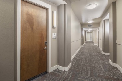 Apartment front door in a climate-controlled hallway at Camden Victory Park