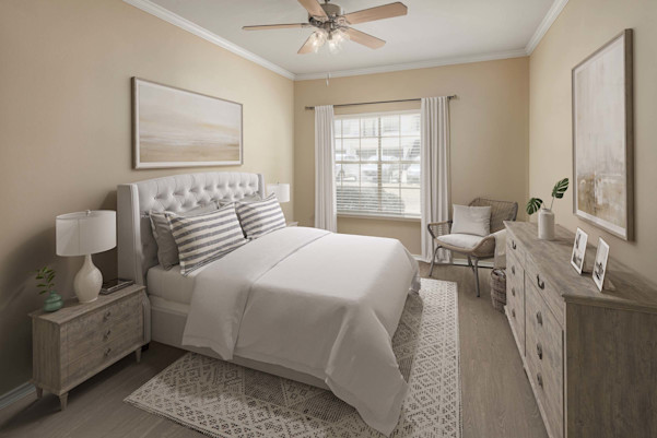 First-floor bedroom with wood-style flooring at Camden Legacy Creek apartments in Plano, TX