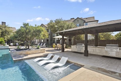 Poolside covered grills at the second pool at Camden Amber Oaks