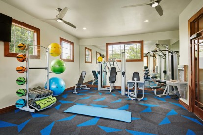 Fitness center strength machines and yoga area