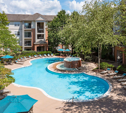 Pool number 1 surrounded by beautiful mature trees 